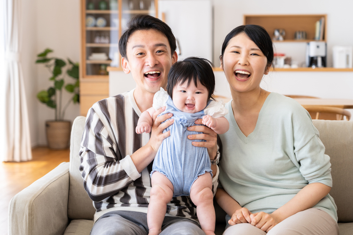 portrait of young asian family